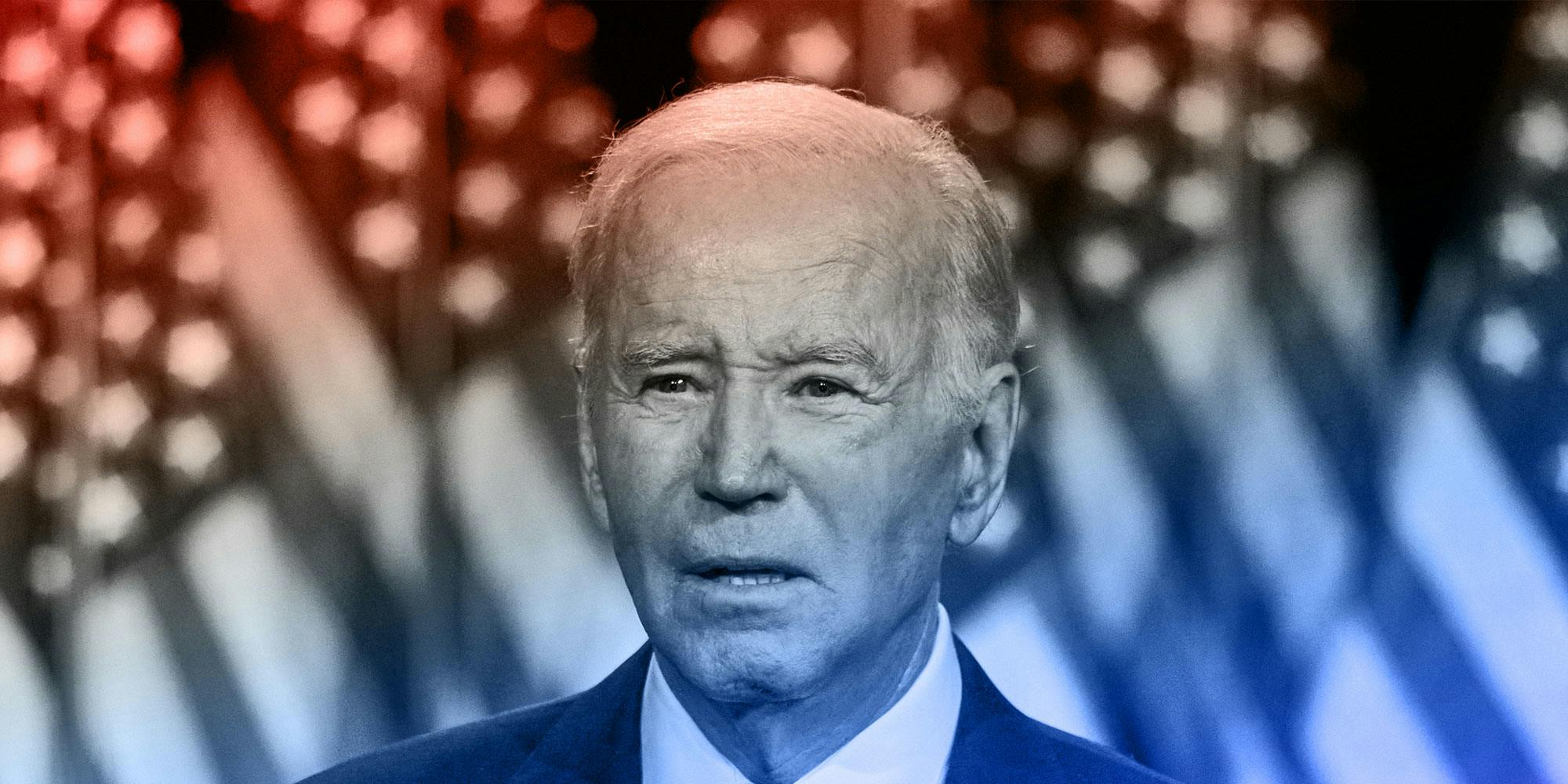 Joe Biden looking confused while giving a speech, his background is a row of American flags