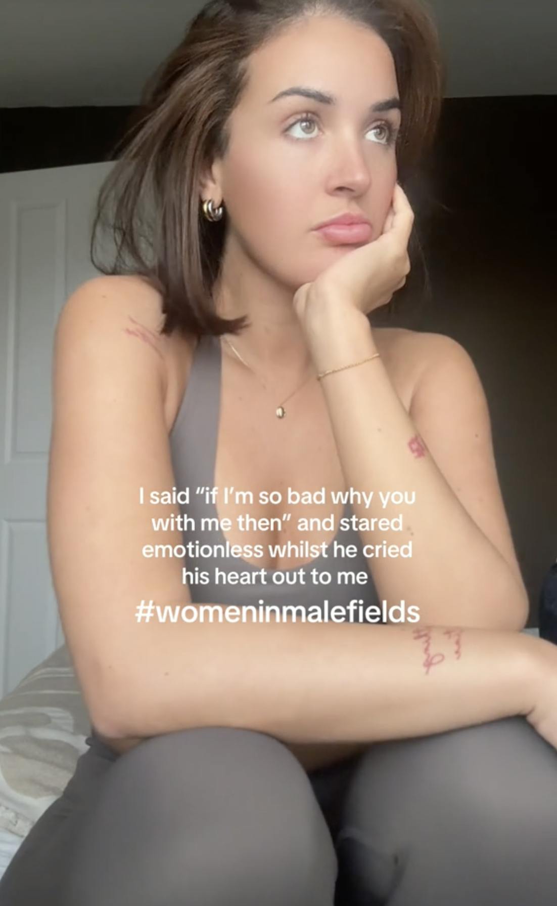 A TikTok video of a woman in workout clothes, with the caption 'If I'm so bad why u with me then...etc. #Womeninmalefields'