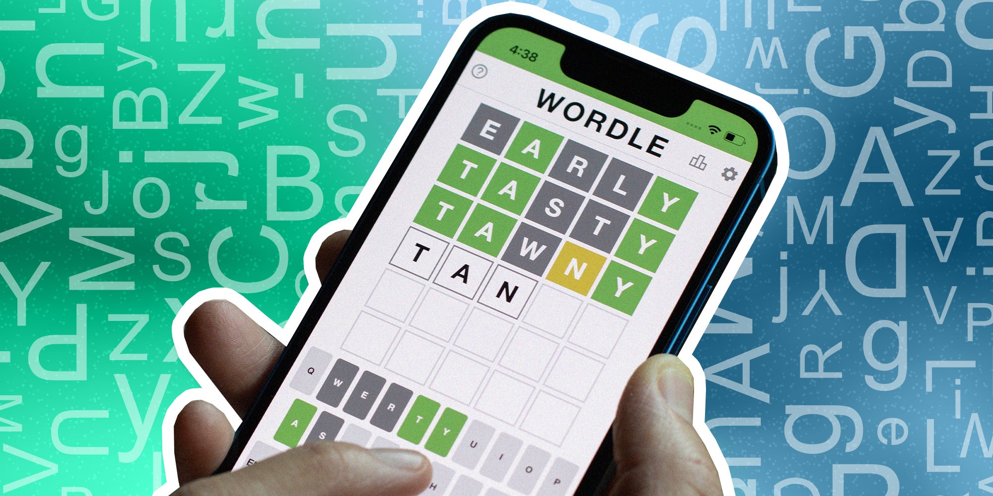 Hand holding up phone with Wordle App on Display