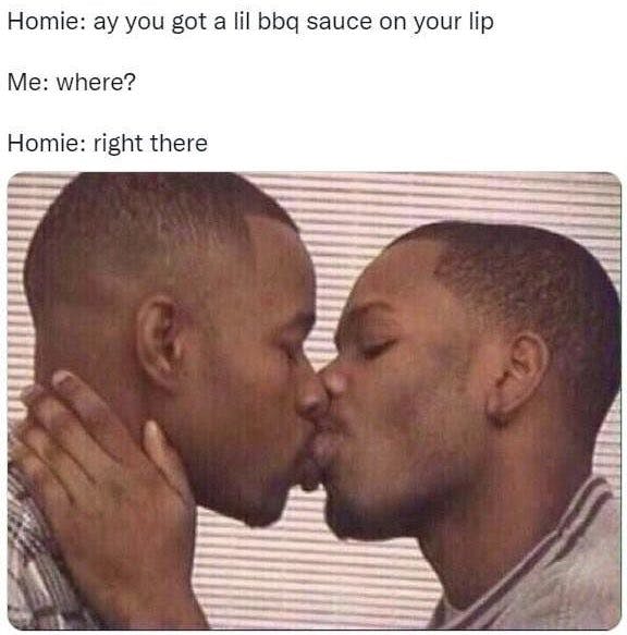 Photo of Black men making out with one saying the other had BBQ sauce on his lip.