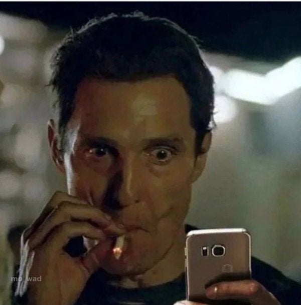 matthew mcconaughey smoking meme holding a phone variation