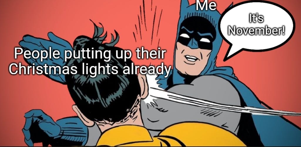 November meme of Batman slapping Robin for putting up Christmas lights too early.