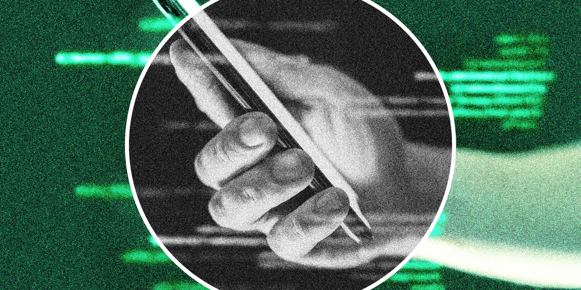 Hand holding phone with coded text floating around