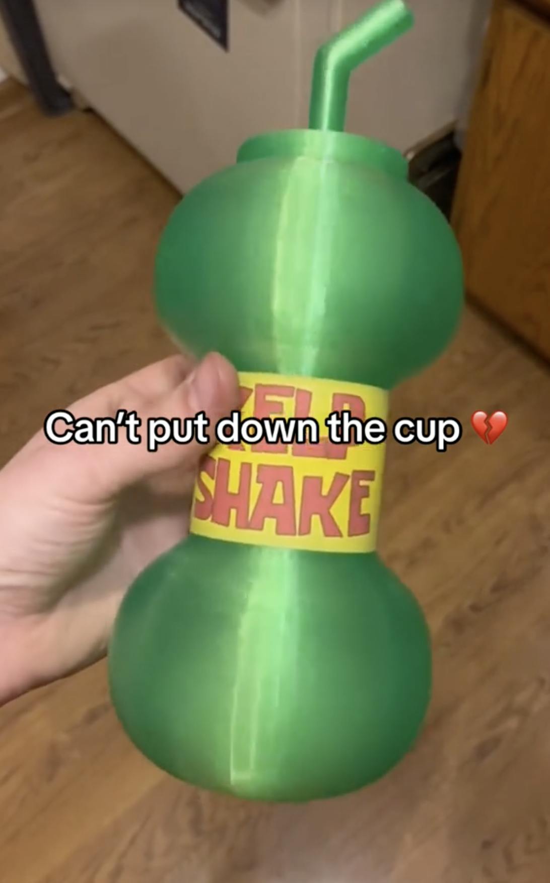 A Spongebob Squarepants Kelp Shape with the 'I can't put down the cup' meme on it