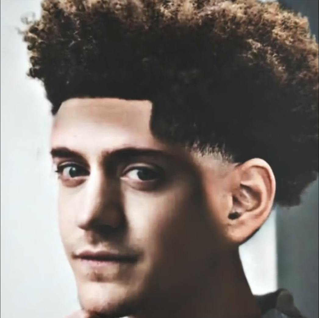 A photoshopped headshopt of Ninja with a low taper fade