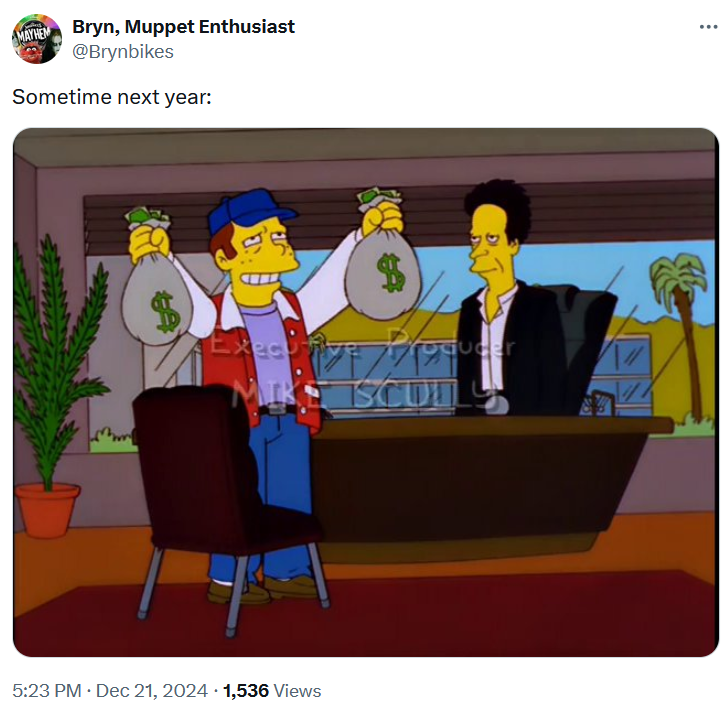 Tweet with a screenshot of a man in a Hollywood office holding up bags of money from The Simpsons.