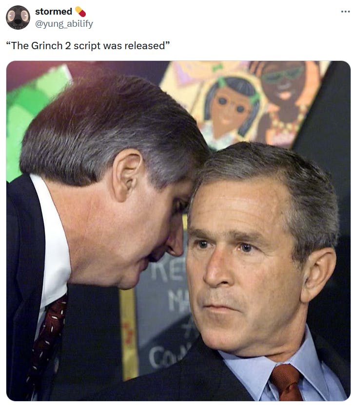 George W. Bush getting informed about 9/11 meme with the comment 'The Grinch 2 script was released.'