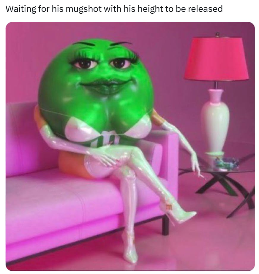 Tweet that reads, 'Waiting for his mugshot with his height to be released' with a photo of a sexualized green M&M character.