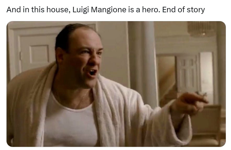 Tweet that reads, 'And in this house, Luigi Mangione is a hero. End of story' with a photo of an angry man pointing at someone he's talking to.