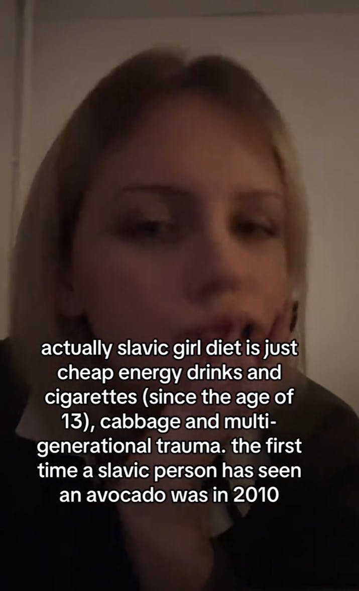 A woman staring at the camera with a text overlay explaining that the slavic girl diet is very different from the slavic doll trend.