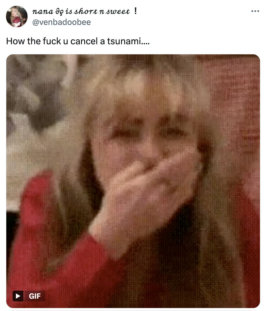 Tweet that reads, 'How the fuck u cancel a tsunami....' with a GIF of a laughing blonde woman with a hand over her mouth.