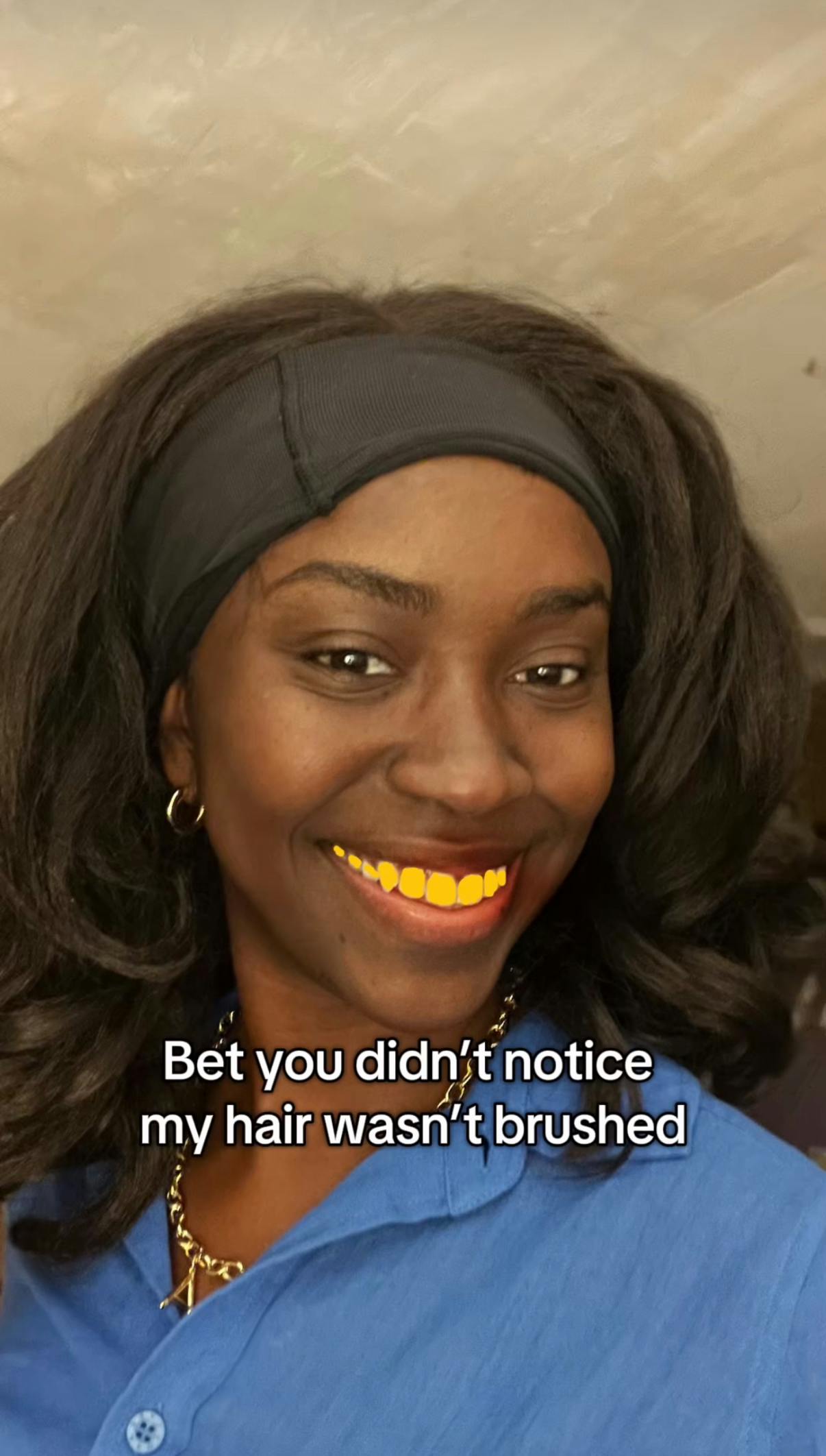 Photo of a woman with her teeth purposely turned yellow. Text overlay reads, 'Bet you didn't notice my hair wasn't brushed.'