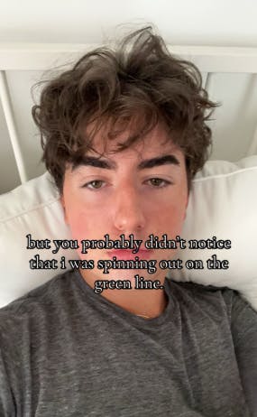 TikTok photo of a young man in bed staring blankly at the camera. Text overlay reads, 'but you probably didn't notice that I was spinning out on the green line.'