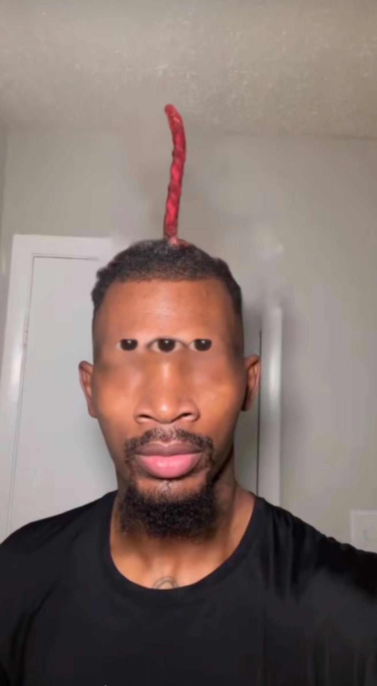 Eye of Rah meme edit with a Black man with three eyes on his forehead.