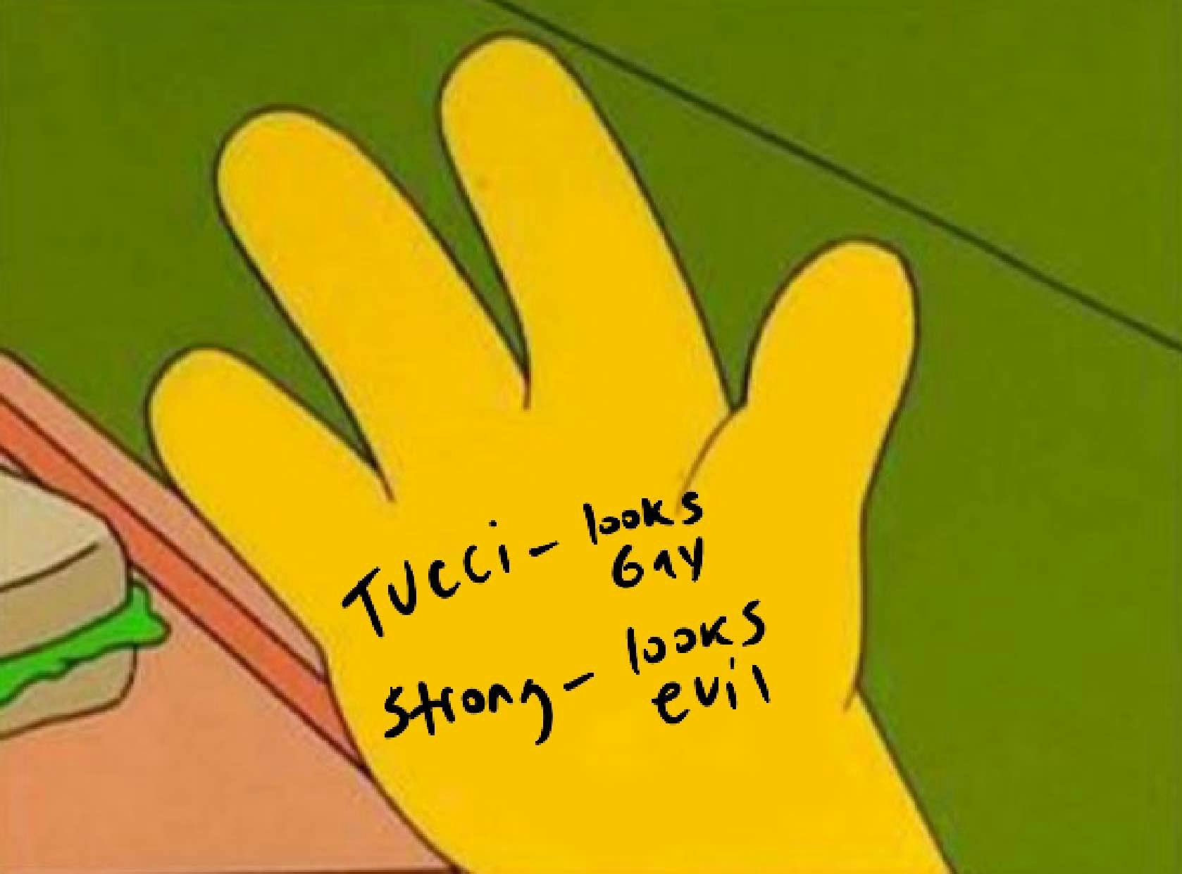 Golden Globes meme of a Simpson character hand, text on the hand reads, 'Tucci - looks gay. Strong - looks evil'