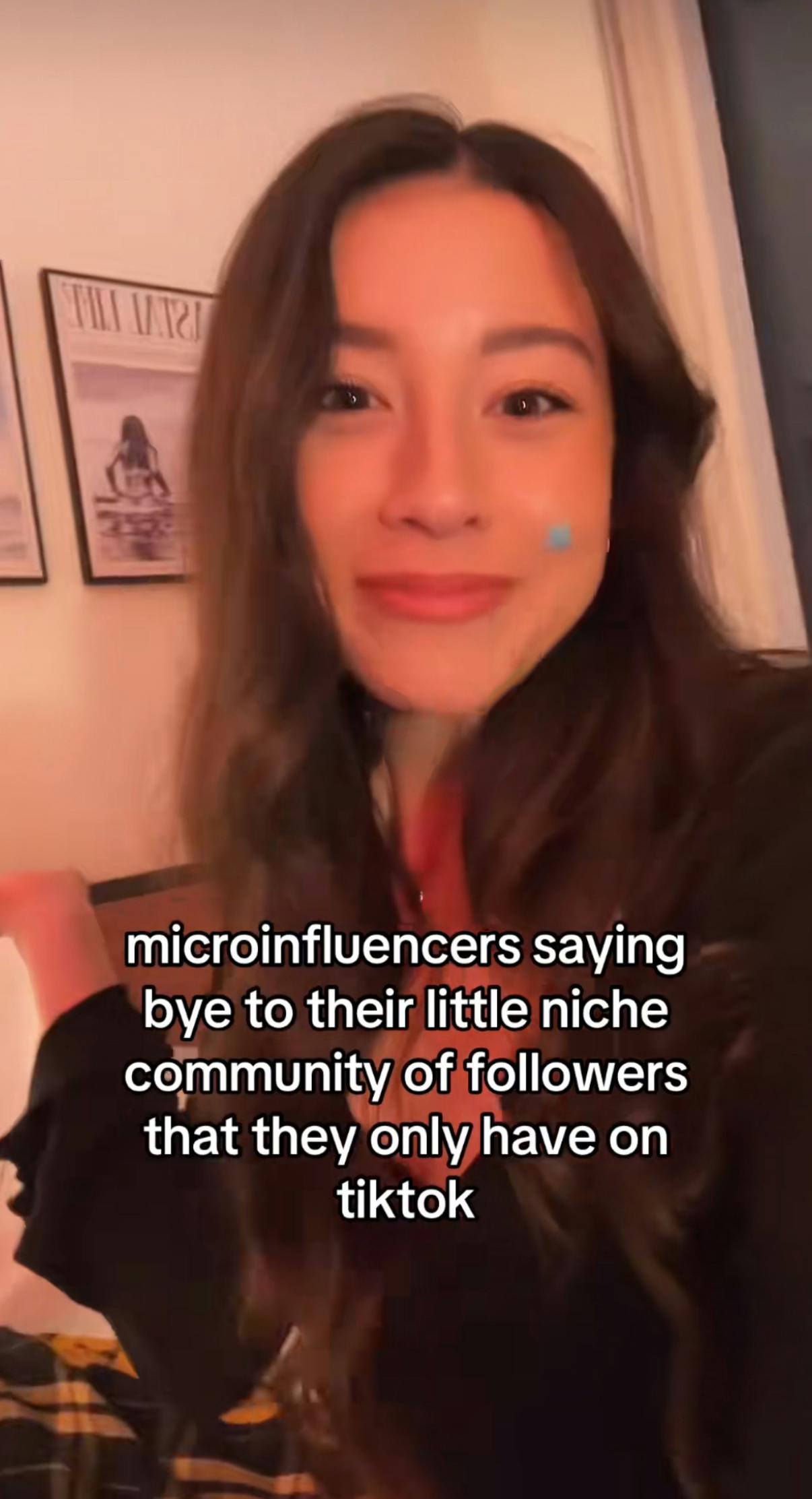 TikTok screenshot of a smiling woman. Text overlay reads, 'microinfluencers saying bye to their little niche community of followers that they only have on tiktok'