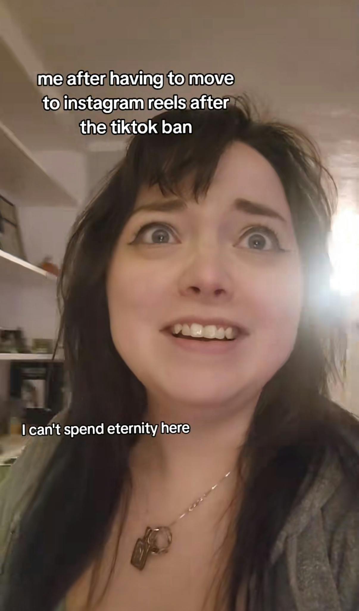 TikTok screenshot of a woman looking scared. Text overlay reads, 'me after having to move to instagram reels after the tiktok ban. I can't spend eternity here.'