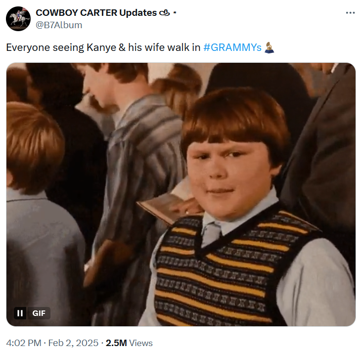 Tweet with a gif of a kid waving and then making a confused face.