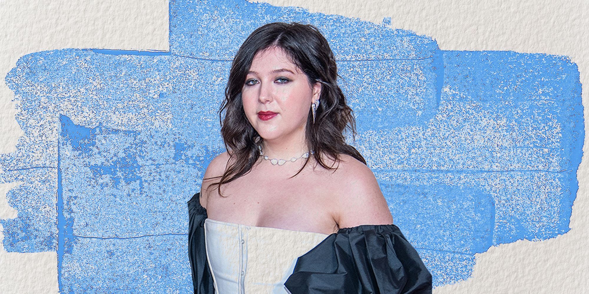 Lucy Dacus over blue paint background