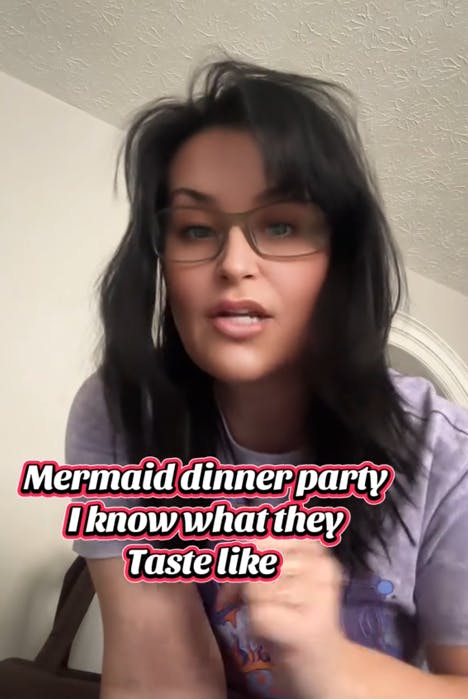 Mermaid eating dinner party TikTok video with a woman speaking to the camera behind a caption reading 'Mermaid dinner party I know what they Taste like.'