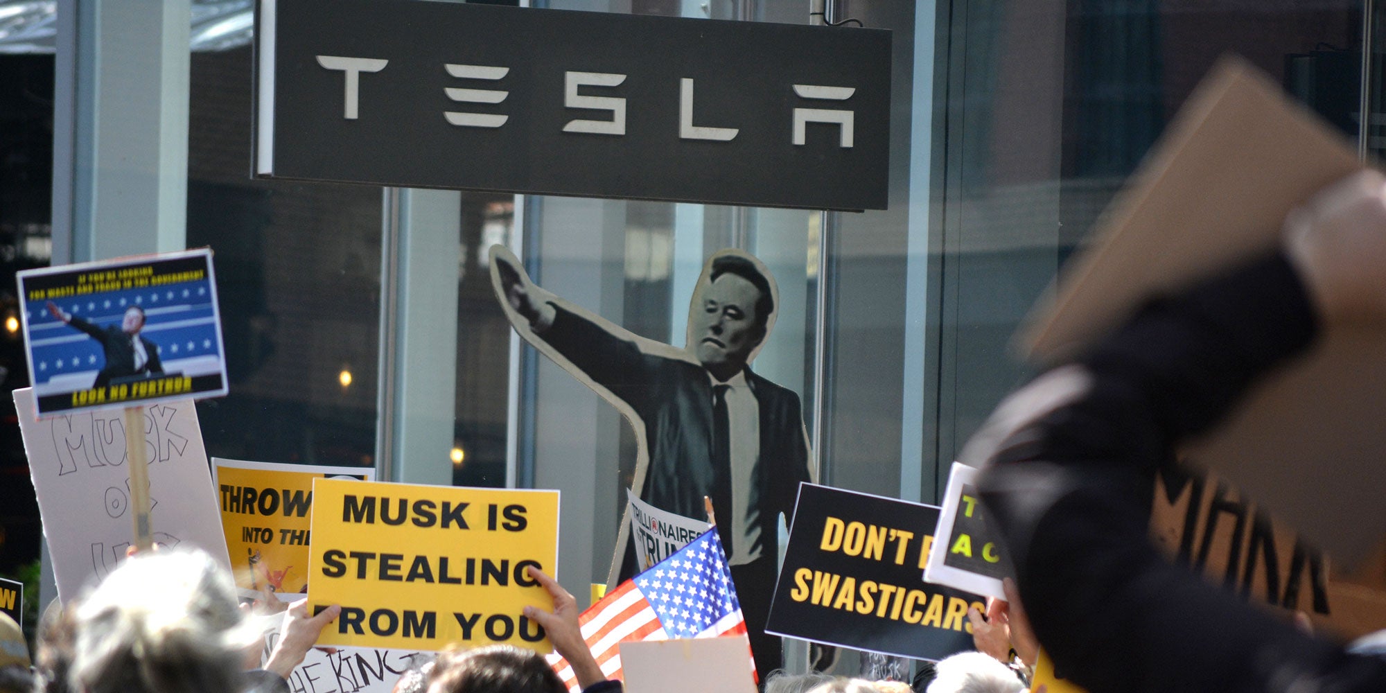 Photo of a Tesla protest in New York City.
