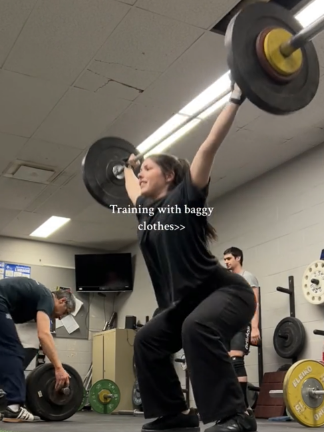 Gen Z vs Millennial gym wear TikTok video showing a woman in bagging clothes power lifting.
