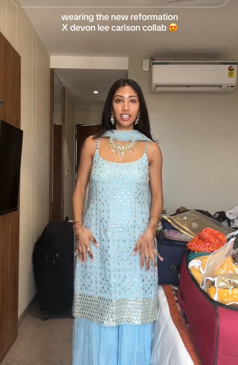TikTok video showing a woman in a traditional lehenga and dupatta.