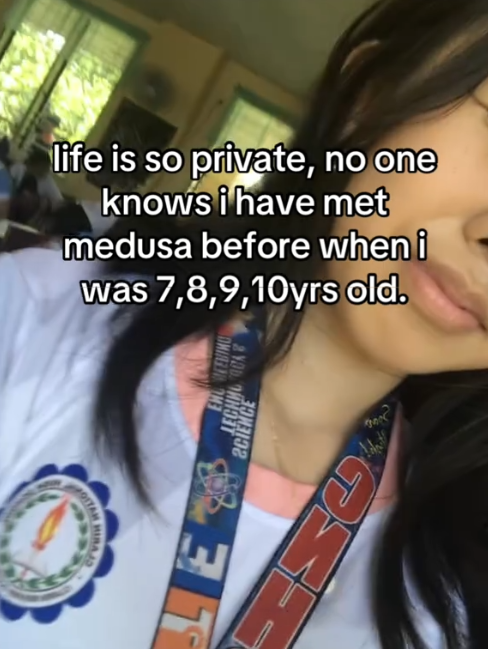 TikTok video of a woman with a caption reading 'life is so private, no one knows i met medusa before when i was 7, 8, 9, 10 yrs old.'