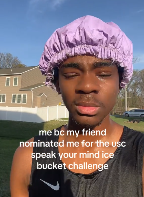 TikTok video of a wet man in a shower cap with a caption reading 'me bc my friend nominated me for the usc speak your mind ice bucket challenge.'