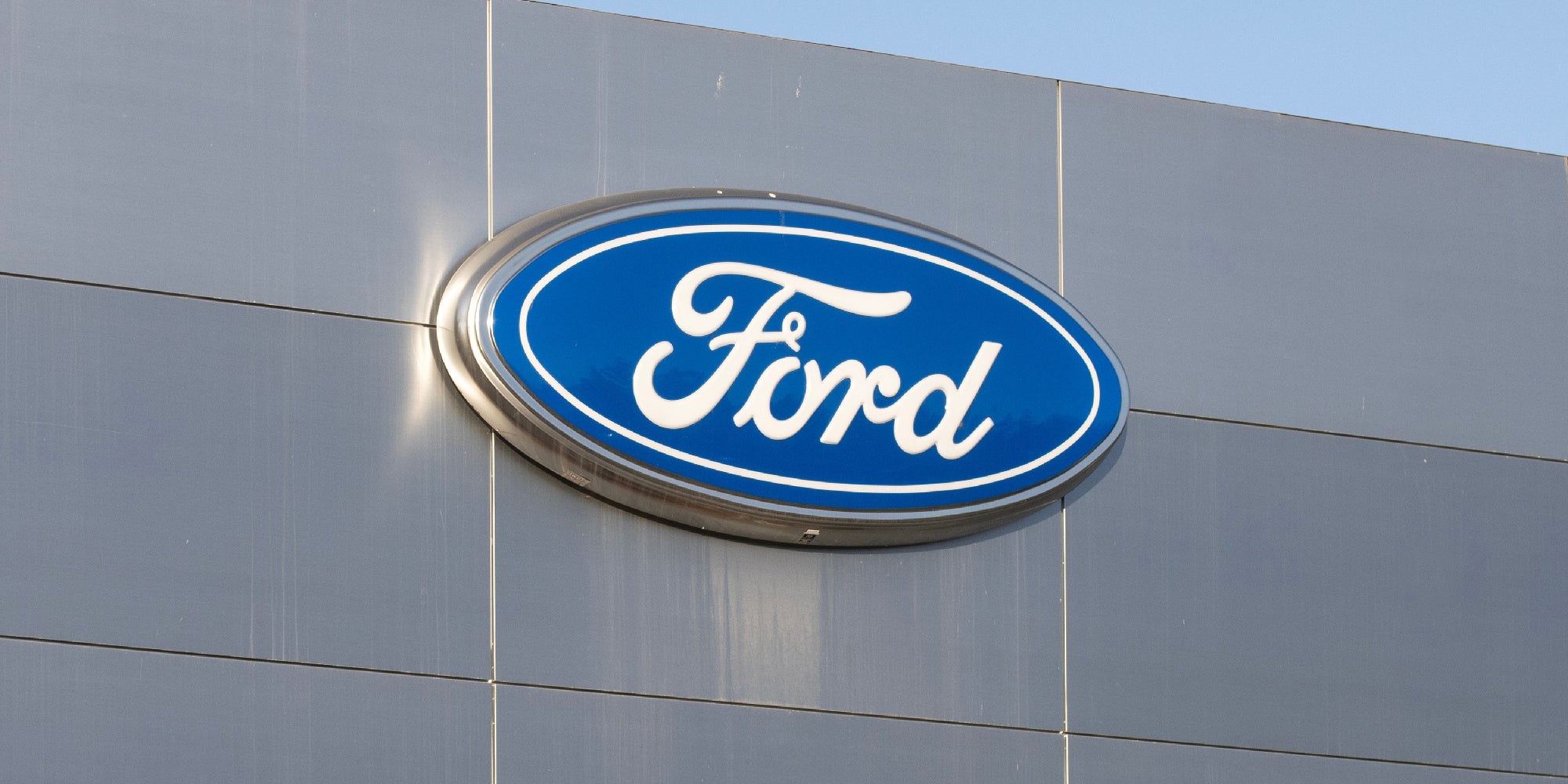 Ford motor company logo at a Ford dealership.