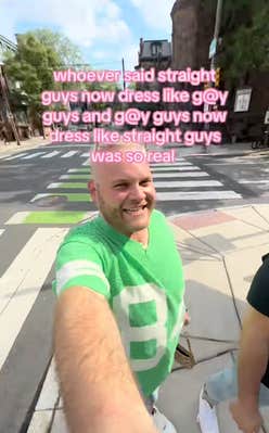 Gay man in a green sports jersey.