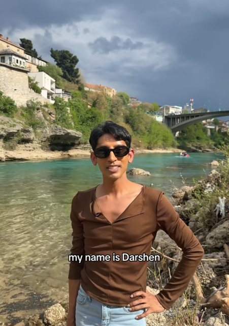 'My name is Darshen' TikTok video in front of a river.