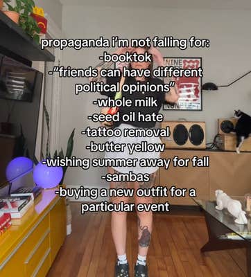 TikTok video with a woman in a black top and white shorts.