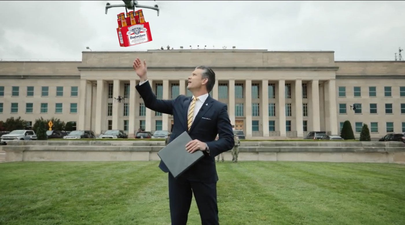 A drone delivering U.S. Secretary of Defense Pete Hegseth a six pack of Budweiser.