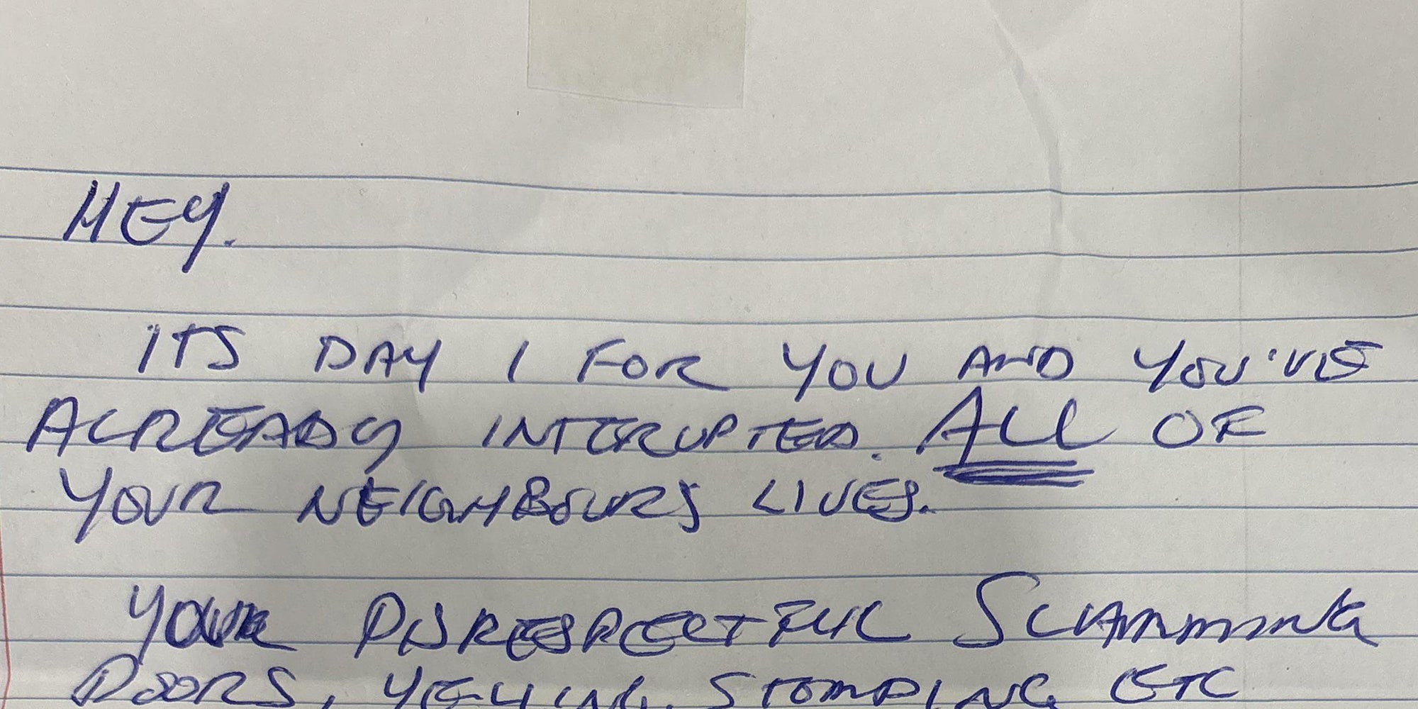 Handwritten note on lined paper in all capitals reading, 'Hey. Its day 1 for you and you've already interrupted ALL of your neighbor's lives.'