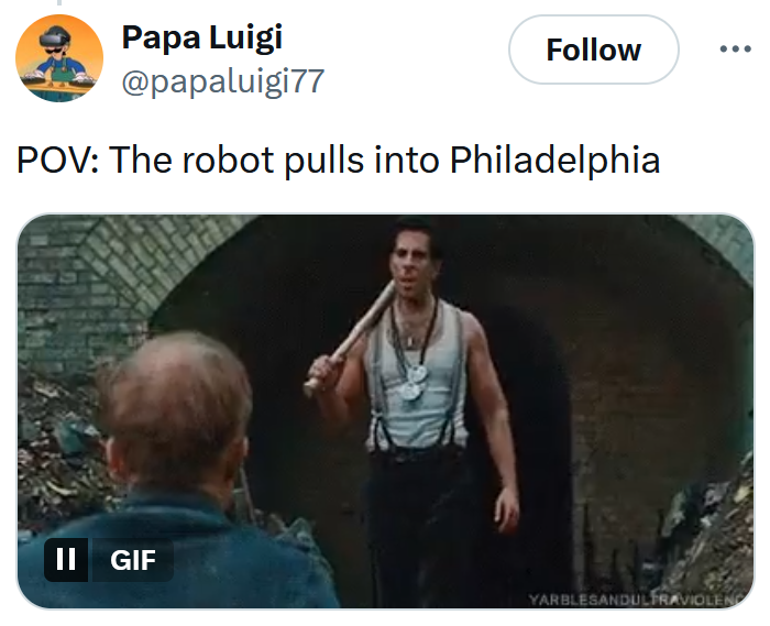 Tweet reading 'POV: The robot pulls into Philadelphia' with an Inglourious Basterds gif.