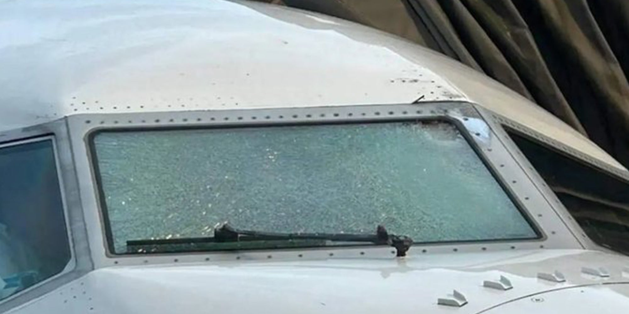 Shattered windshield of a United Airlines flight.