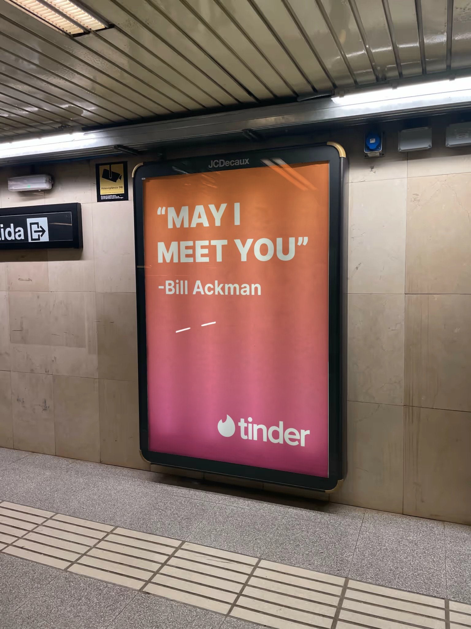 Tinder subway ad reading ''MAY I MEET YOU'.'