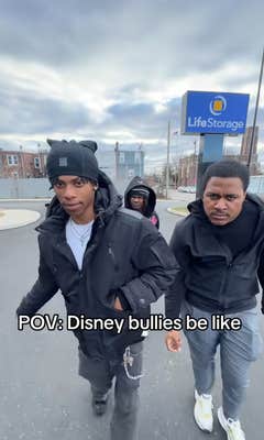 Three people acting like Disney bullies walking up to someone outside like the Sharks from West Side Story.