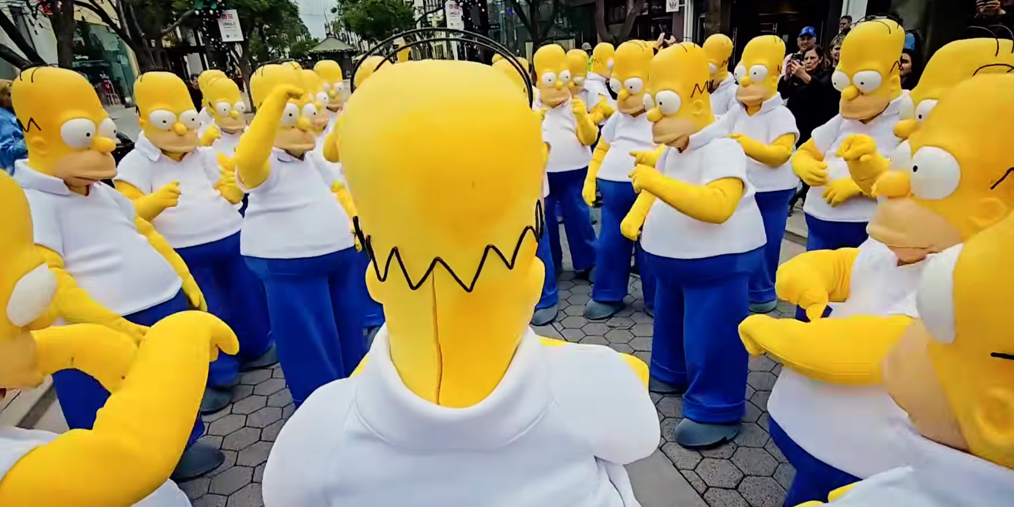 Dozens of people in Homer Simpson costumes in Santa Monica.