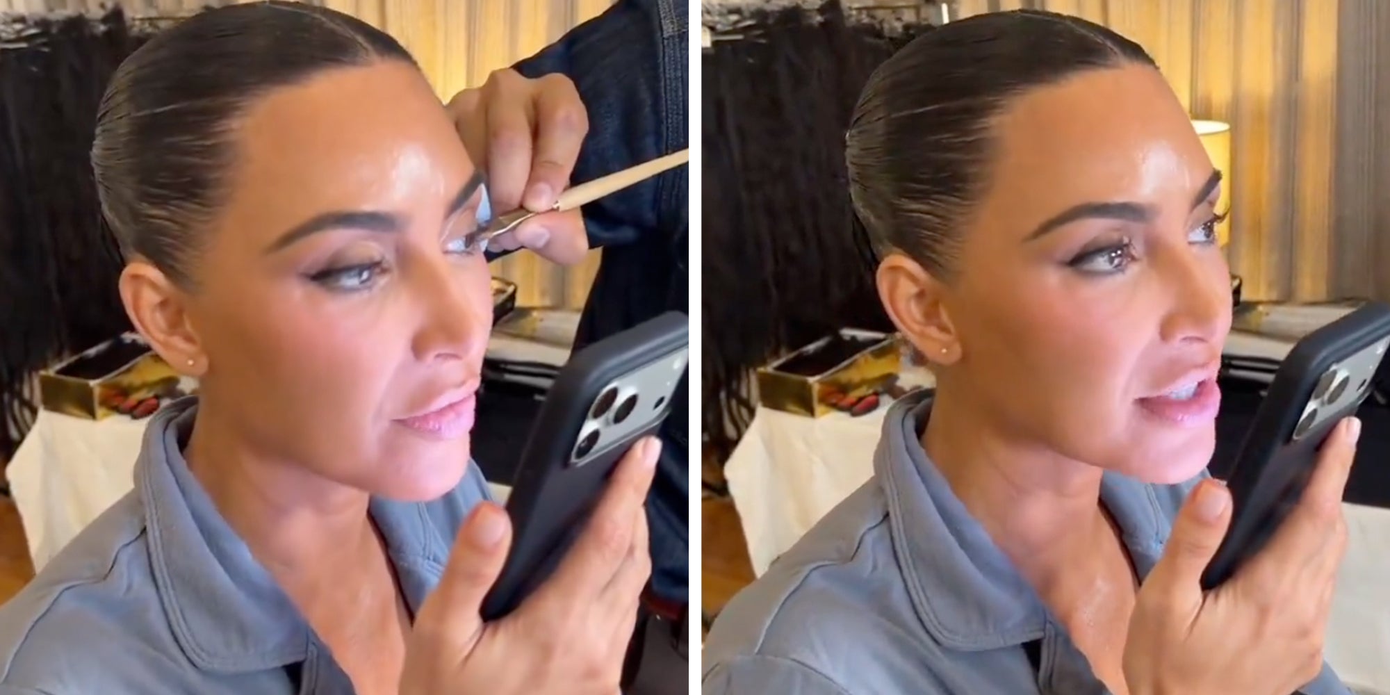 Kim Kardashian speaking into the phone while getting her makeup done.