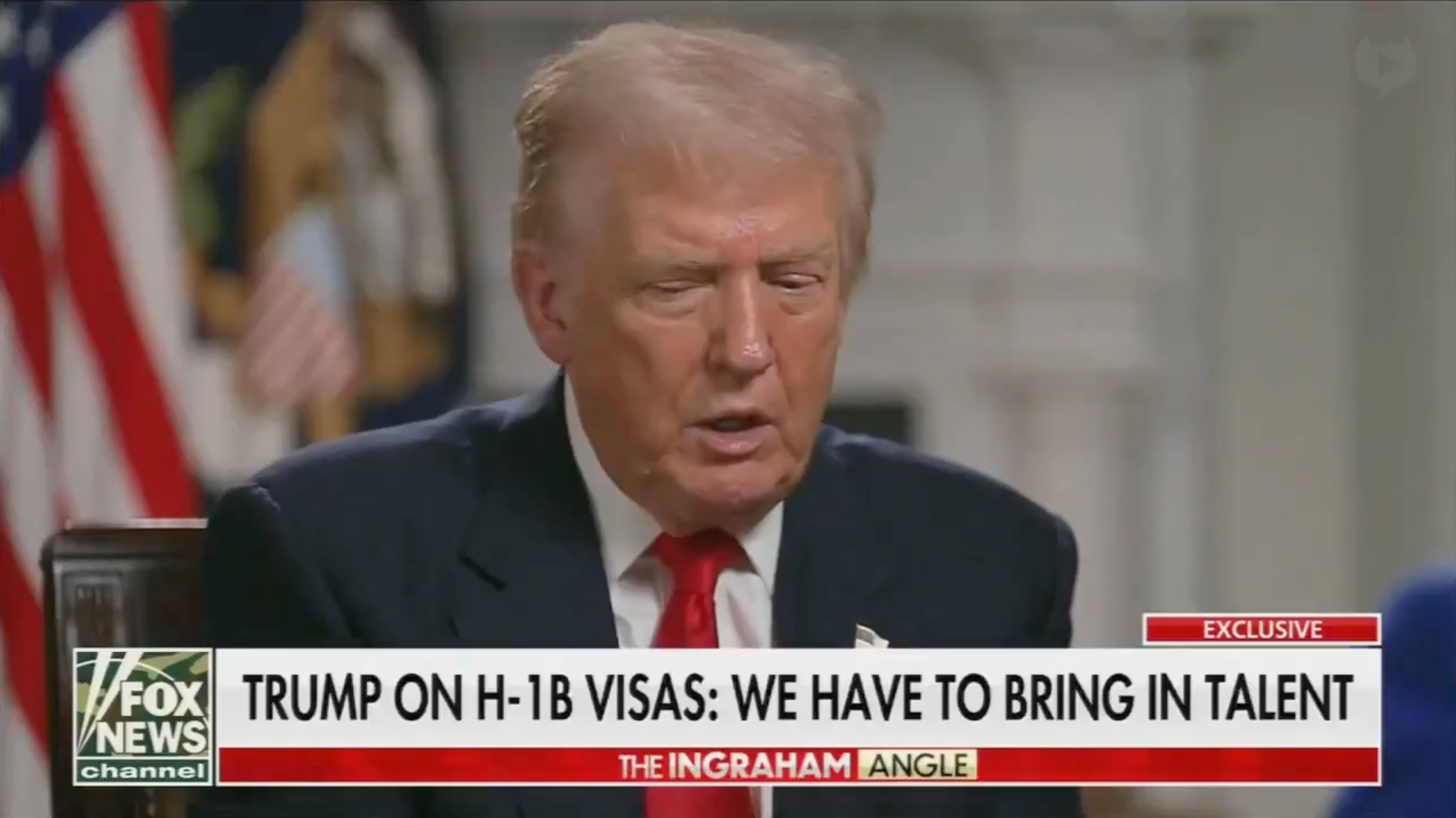 Trump in an interview. Lower thirds read, "Trump on H-1B visas: we have to bring in talent."