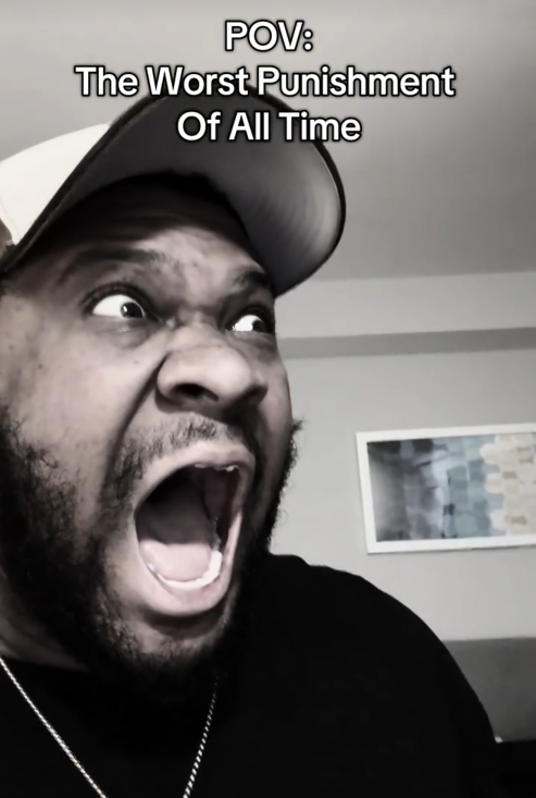 TikTok video showing a black and white image of a man screaming in horror.