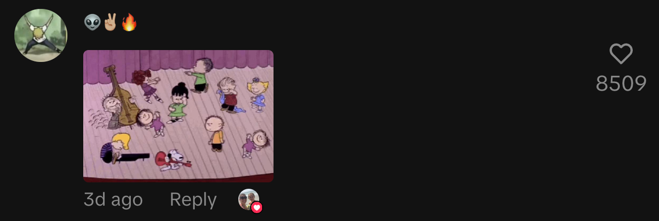 Peanuts gang performing theme song and dancing on stage in Charlie Brown Christmas Special