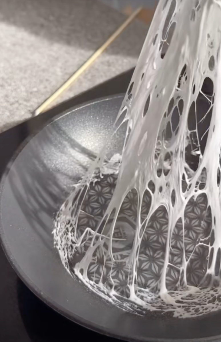 @natasha.ffb/TikTok melting marshmallow in a frying pan to make a marshmallow net