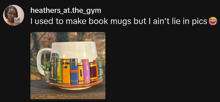 TikTok comment reading 'I used to make book mugs but I ain’t lie in pics' over a photo of a ceramic mug decorated in 3D books.
