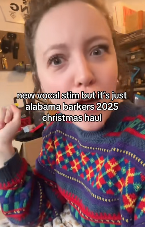 TikTok video of a woman speaking to the camera with a caption reading 'new vocal stim but it's just alabama barkers 2025 christmas haul'