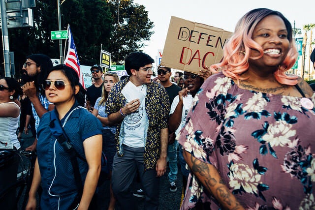 Activists march in defense of Dreamers.