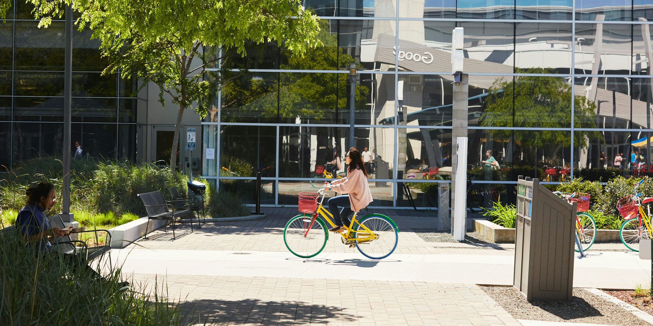 Women riding bike at Google