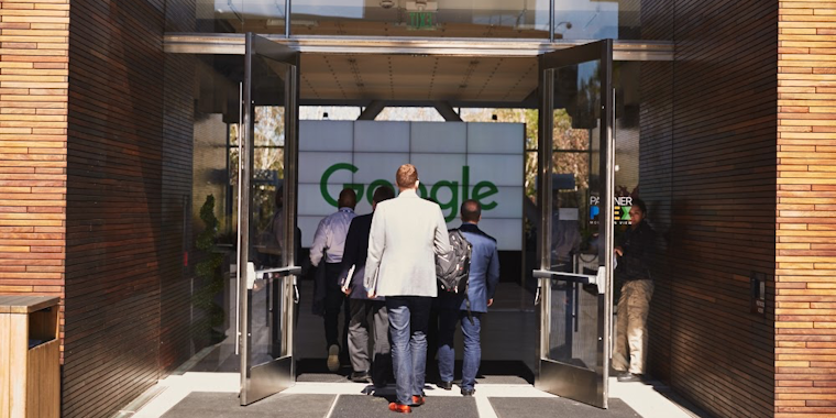 People walking into Google entrance
